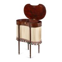 A Fine Federal Carved Mahogany Sewing Table