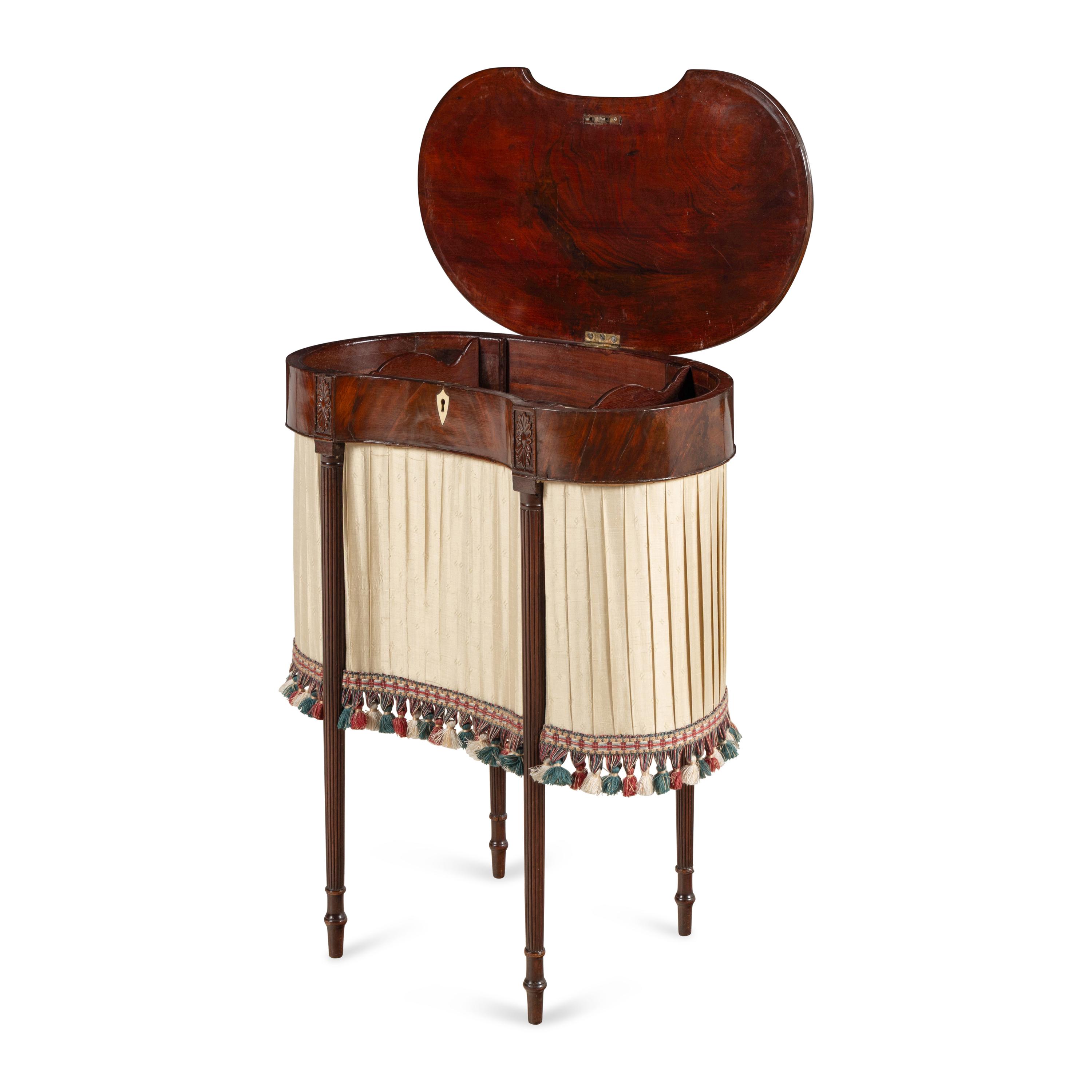 A Fine Federal Carved Mahogany Sewing Table