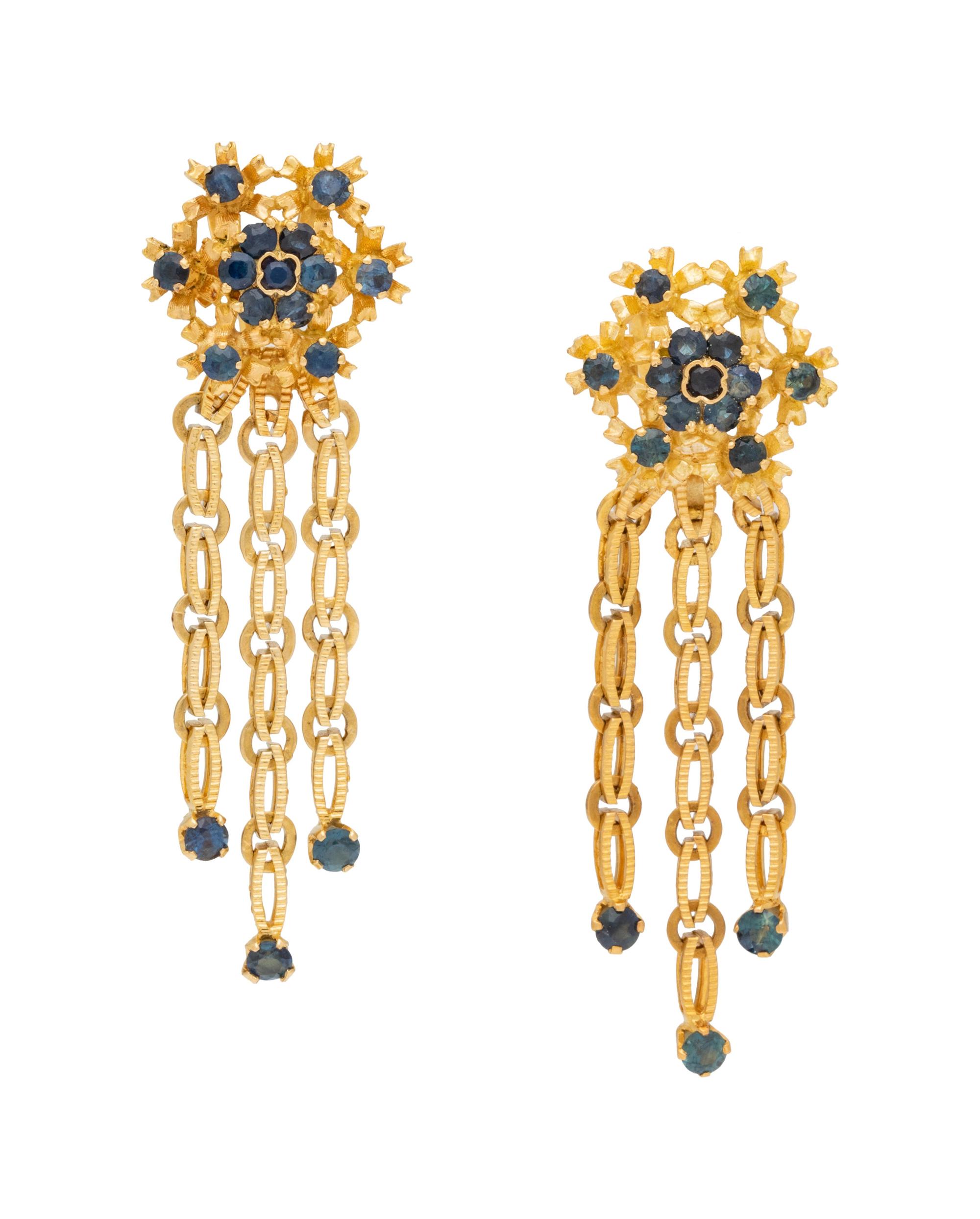 A Pair of 18 Karat Yellow Gold and Sapphire Earclips,