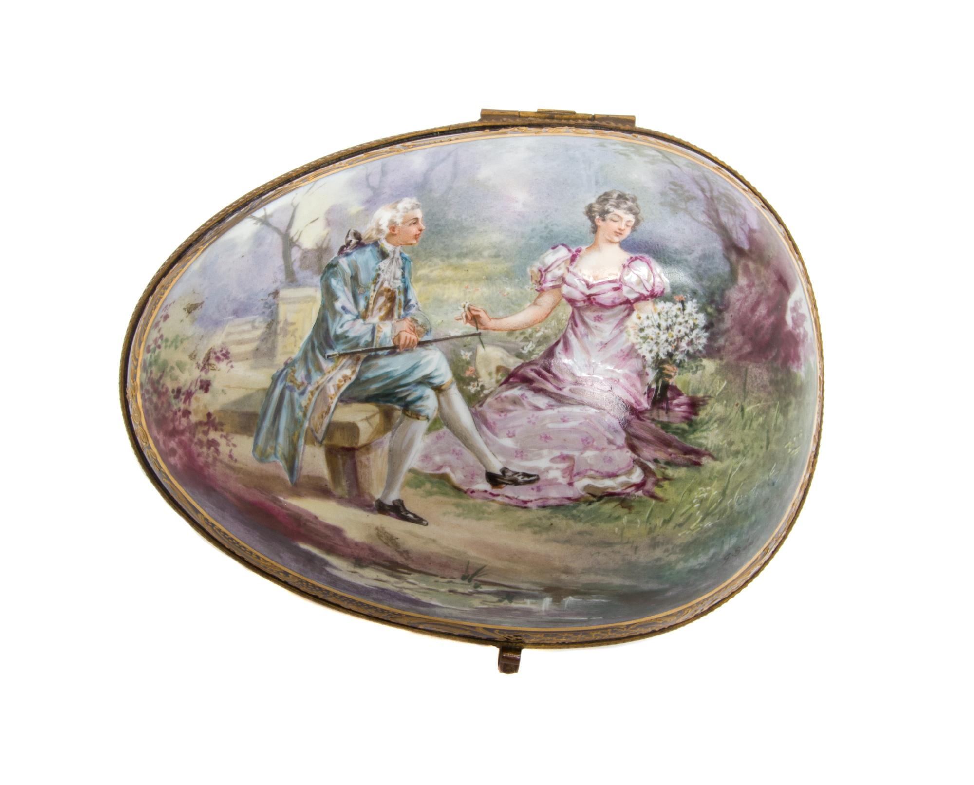 A Sevres Style Porcelain Table Casket, Height 6 3/4 x width 8 1/2 inches.
