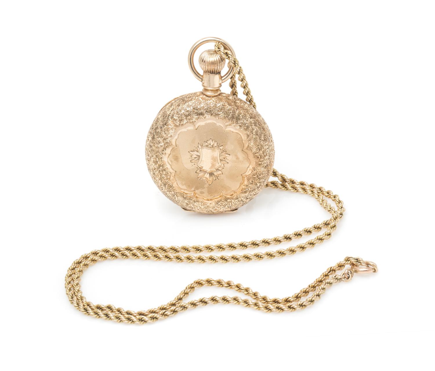 A 14 Karat Yellow Gold Hunter Case Pocket Watch with Chain, Elgin, Circa 1890, 32.20 dwts.