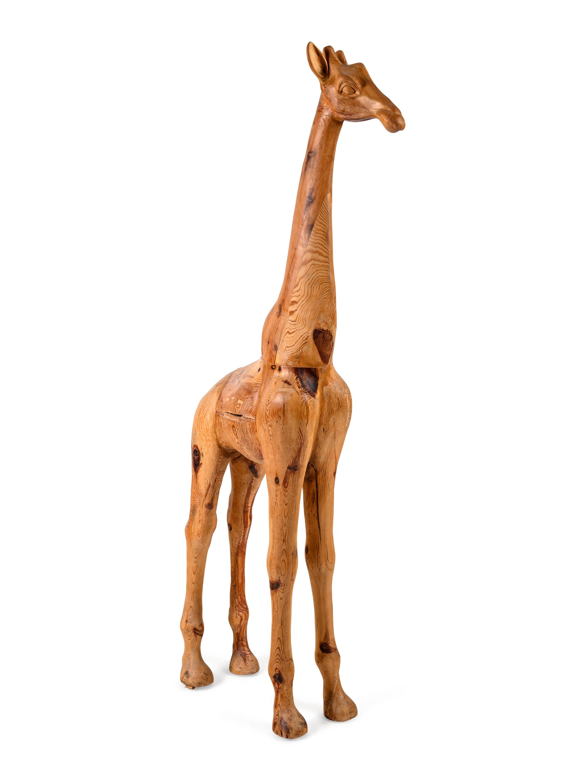 A Carved Pine Figure of a Giraffe