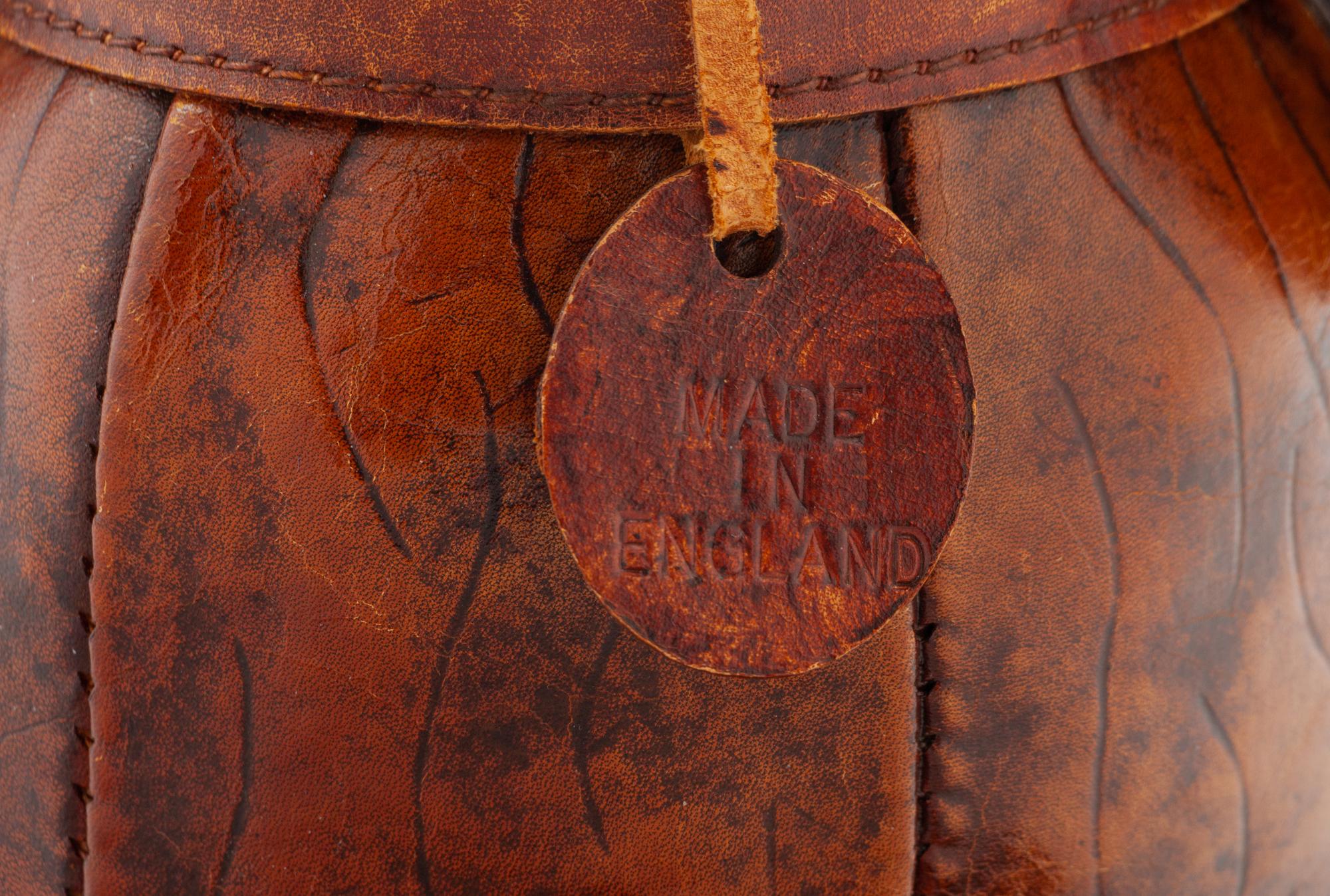 An Omersa & Co. Leather ‘Puppy’ Foot Stool