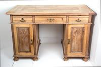 An American Carved Pine Kneehole Desk Height 32 x length 49 x depth 28 3/4 inches. — 20TH CENTURY