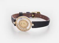 An 18K Yellow Gold Happy Diamonds Ladies Watch by Chopard