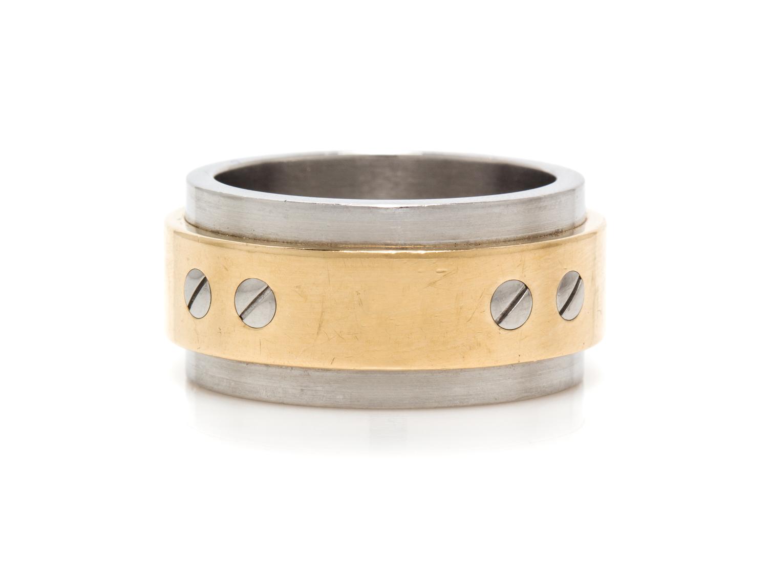An 18 Karat Yellow Gold and Stainless Steel Santos 100 Ring, Cartier, 13.90 dwts.