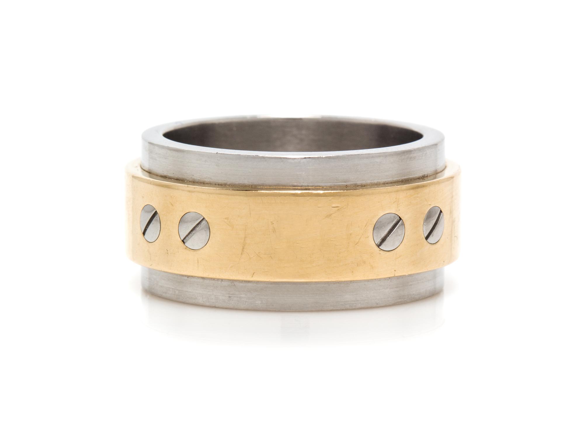 An 18 Karat Yellow Gold and Stainless Steel Santos 100 Ring, Cartier, 13.90 dwts.