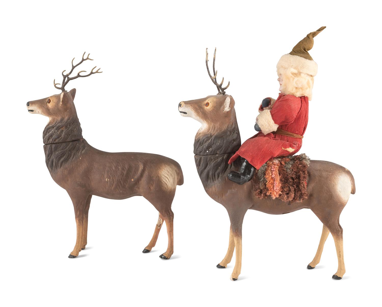 A German Papier-Mâché Santa Claus with Two Reindeer Candy Containers