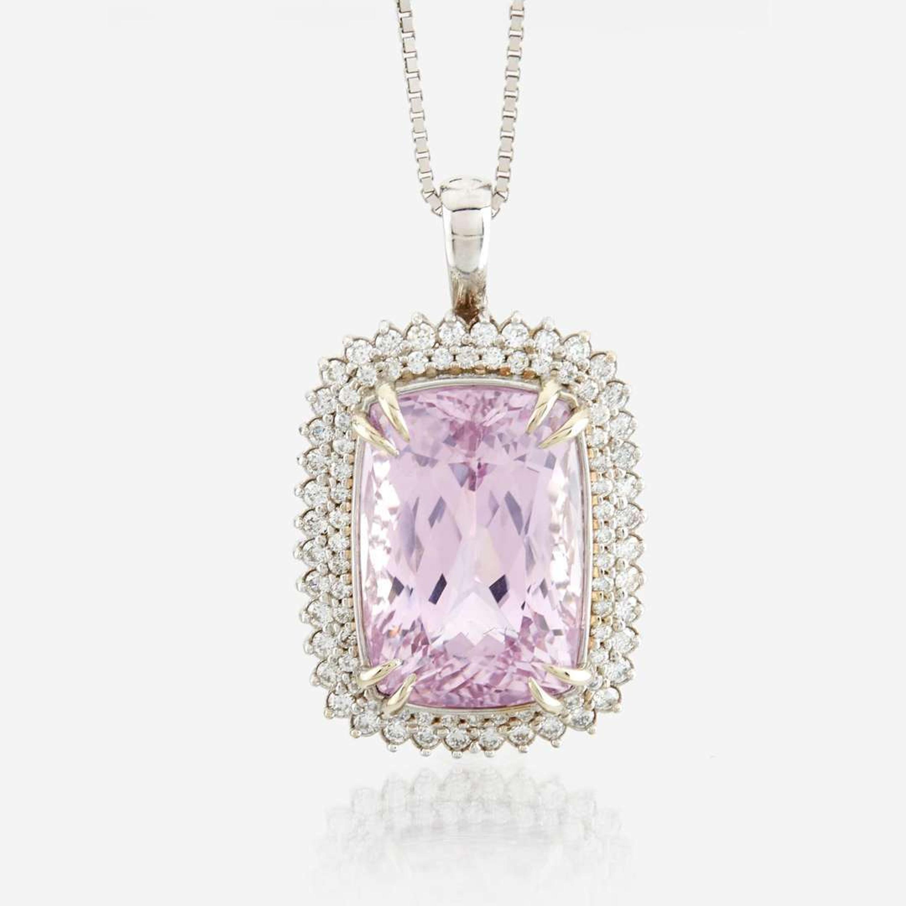A kunzite, diamond, and white gold pendant