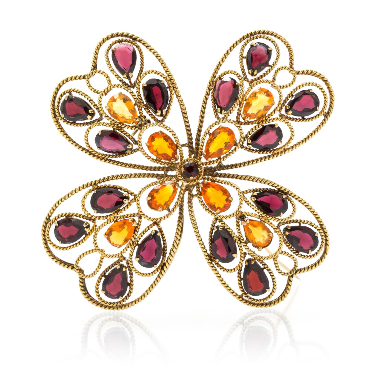 A 14 Karat Yellow Gold Garnet Cross Pendant/Brooch, 17.90 dwts.
