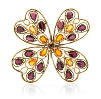A 14 Karat Yellow Gold Garnet Cross Pendant/Brooch, 17.90 dwts.