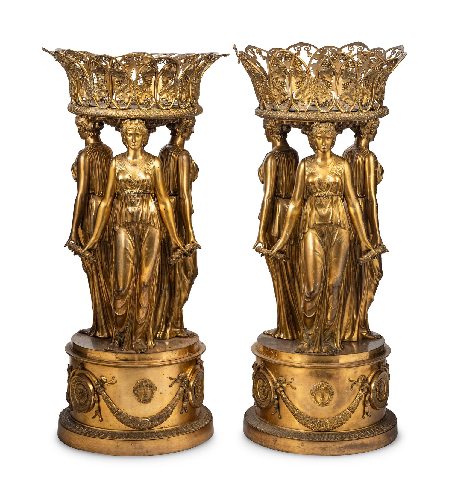 A Pair of Empire Style Gilt Bronze Figural Centerpieces