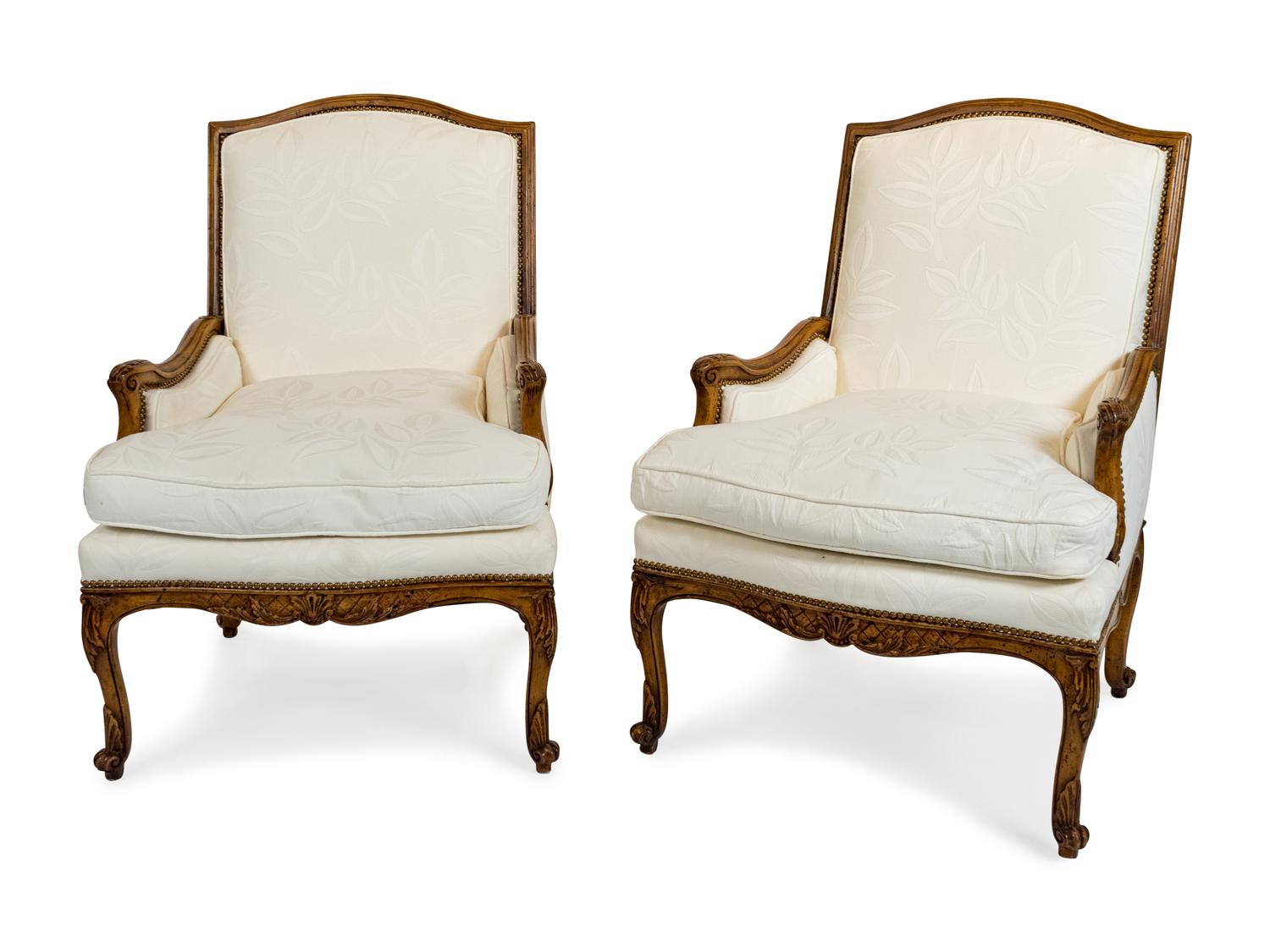 A Pair of Louis XV Style Walnut Fauteuils a la Reine