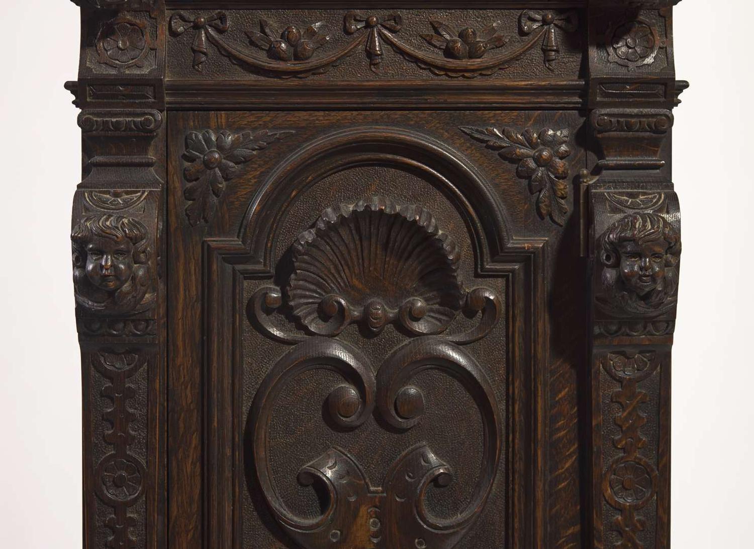 An impressive Renaissance Revival carved oak tall case clock, the case attributed to R.J. Horner & Co., New York, NY, with works by Winterhalder & Hofmeier, Schwaerzenbach, Black Forest, Germany, retailed by Tilden Thurber Co., Providence, RI, late 19th / early 20th century