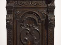 An impressive Renaissance Revival carved oak tall case clock, the case attributed to R.J. Horner & Co., New York, NY, with works by Winterhalder & Hofmeier, Schwaerzenbach, Black Forest, Germany, retailed by Tilden Thurber Co., Providence, RI, late 19th / early 20th century