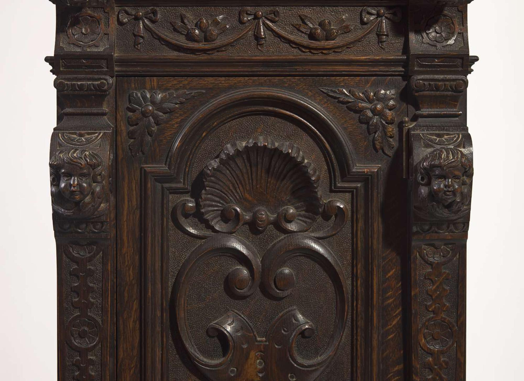 An impressive Renaissance Revival carved oak tall case clock, the case attributed to R.J. Horner & Co., New York, NY, with works by Winterhalder & Hofmeier, Schwaerzenbach, Black Forest, Germany, retailed by Tilden Thurber Co., Providence, RI, late 19th / early 20th century