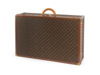 A Louis Vuitton Monogram Canvas Hardside Suitcase. — 20TH CENTURY