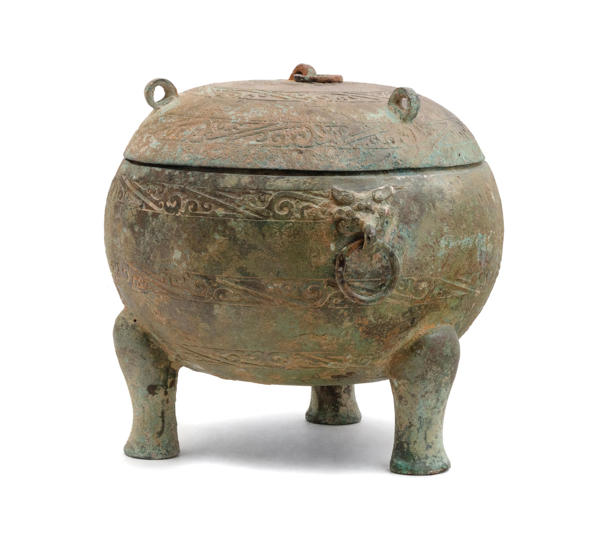 A Chinese Bronze Tripod Covered Vessel, Ding
