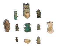 Eleven Egyptian Faience and Terracotta Bes Figures and Amulets
