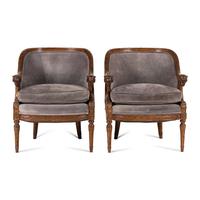 A Pair of Directoire Style Carved Walnut Tub Armchairs