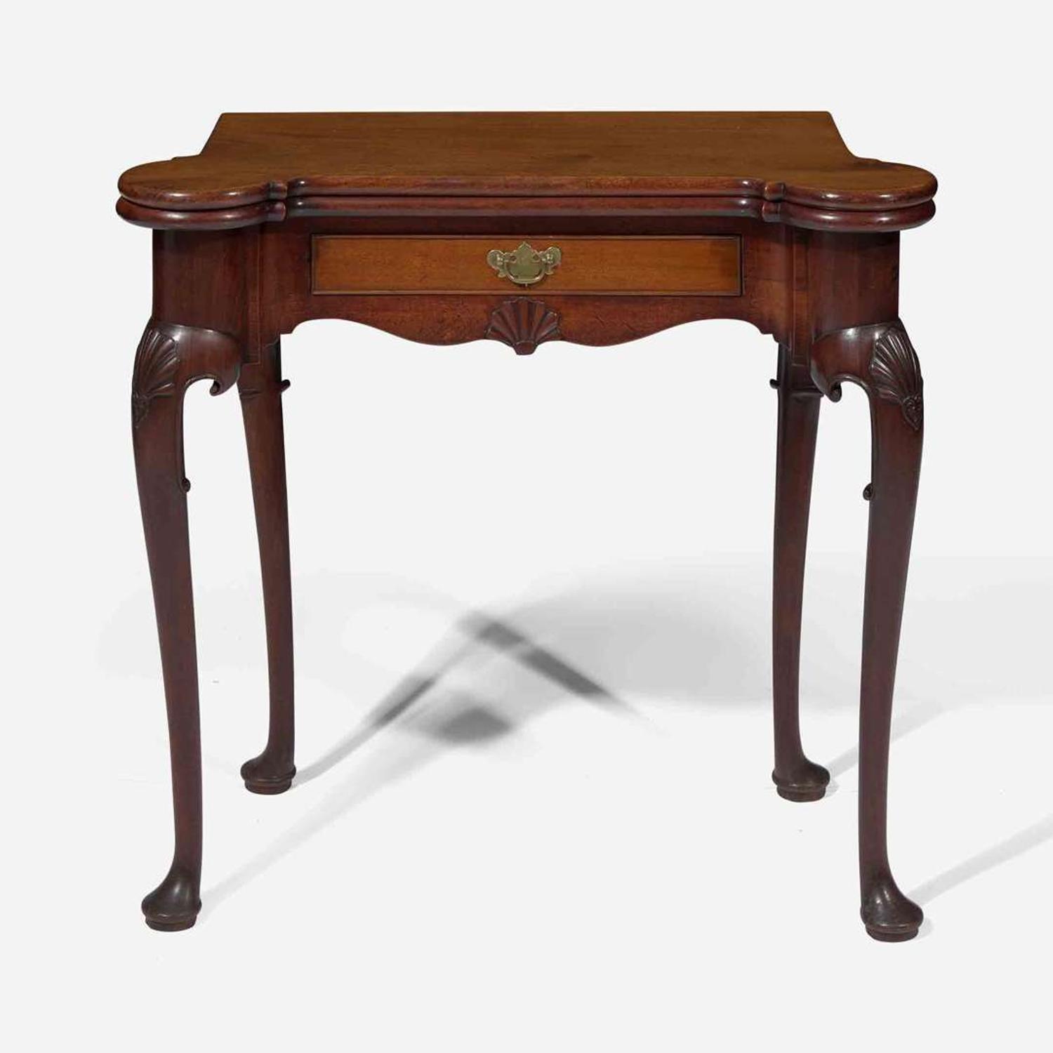 An Irish George II carved mahogany games table circa 1750