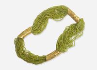 An Elizabeth Gage 18K Yellow Gold and Peridot Necklace