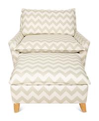 A Contemporary Upholstered Armchair and Ottoman