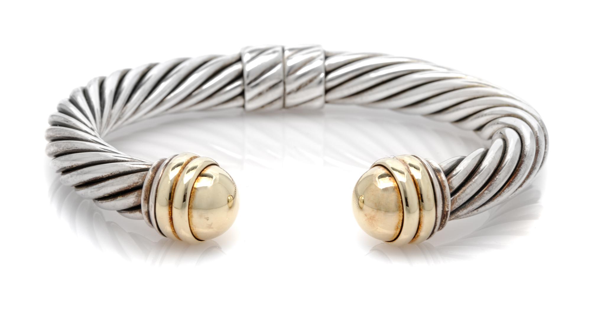 A Sterling Silver and 14 Karat Yellow Gold 'Cable Classics' Bracelet, David Yurman, 32.60 dwts.