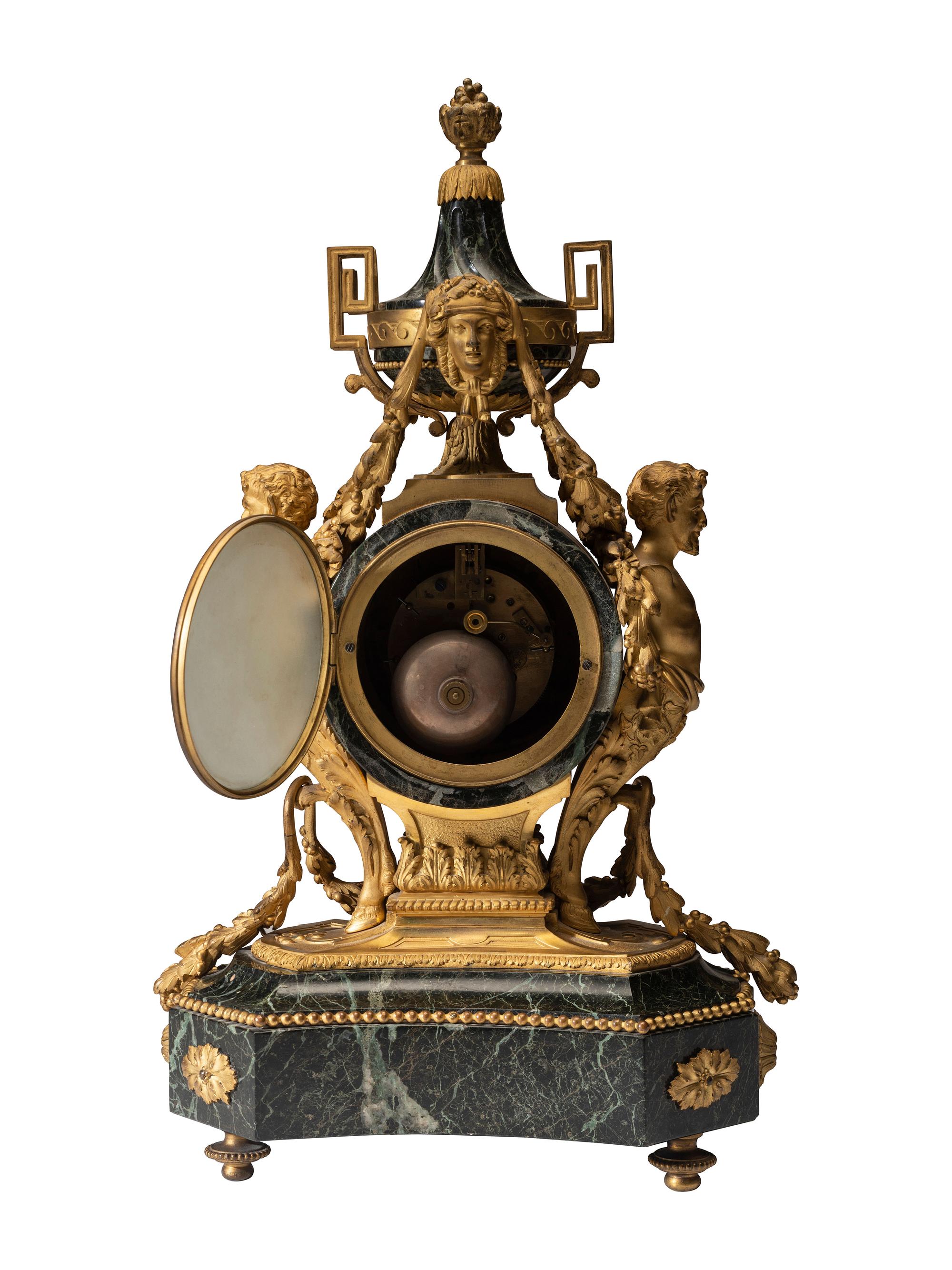 A Napoleon III Gilt Bronze and Marble Clock