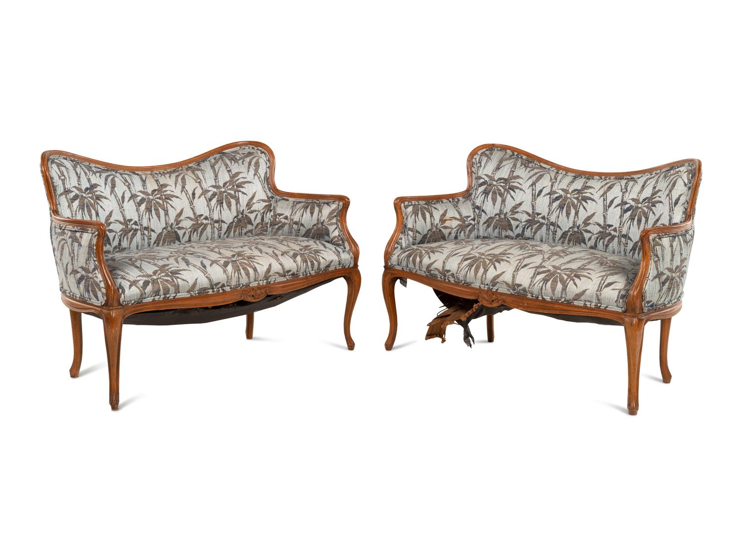 A Pair of Art Nouveau Style Walnut Settees