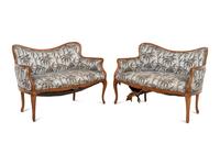 A Pair of Art Nouveau Style Walnut Settees