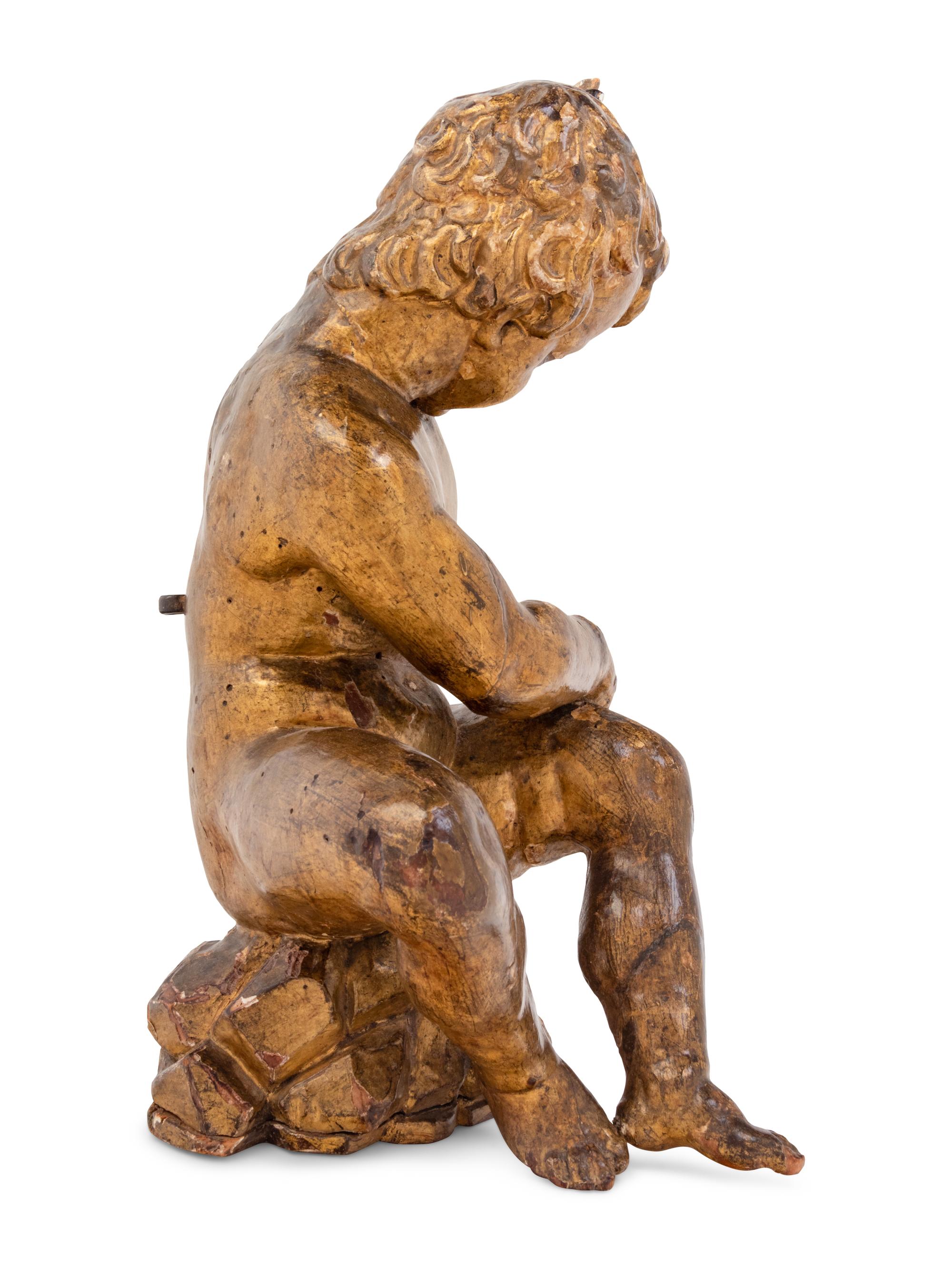 An Italian Giltwood Figural Candle Holder