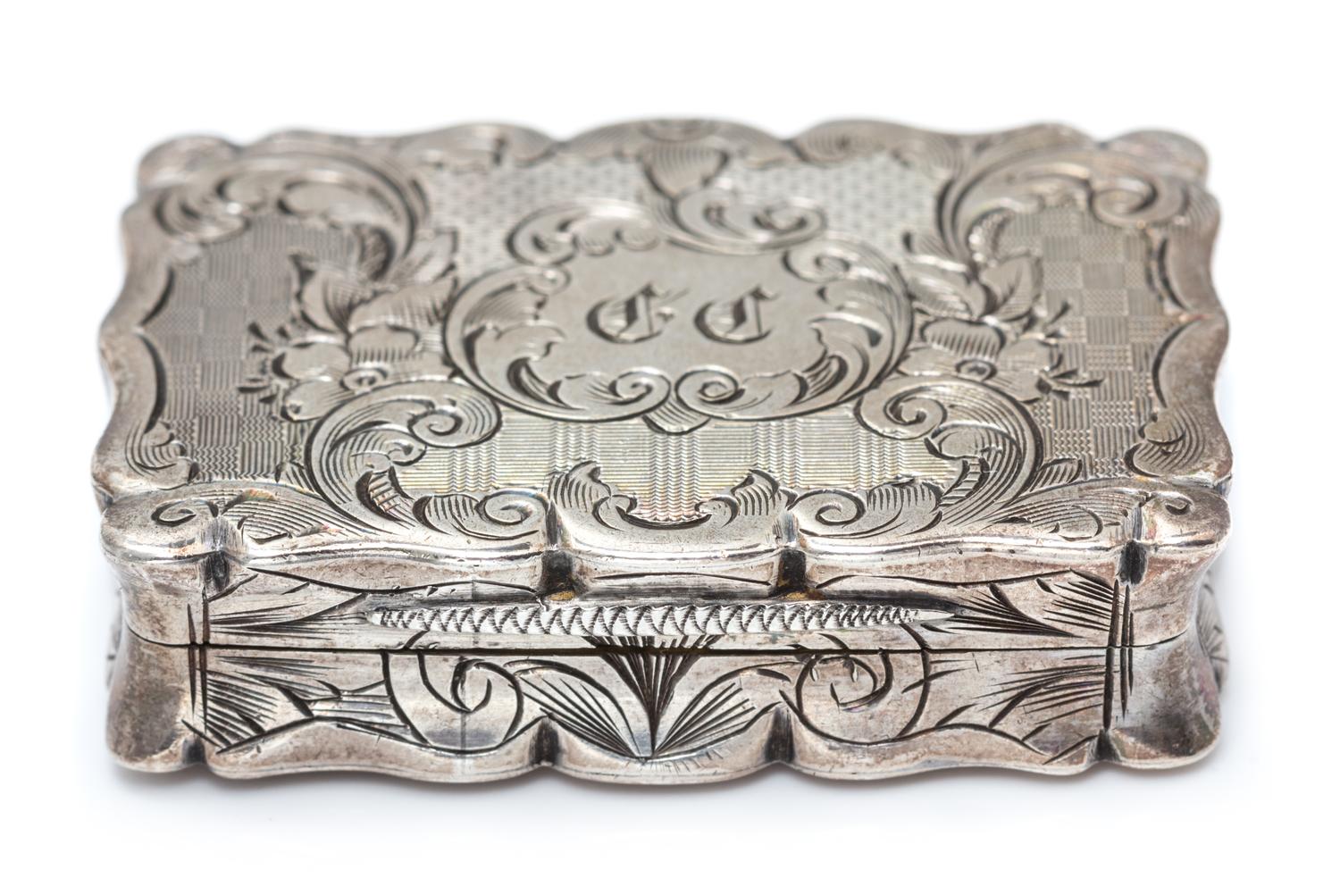A Victorian Silver Vinaigrette, Frederick Marson, Birmingham, 1859, the case with floral, foliate, C-scroll and geometric decoration, t