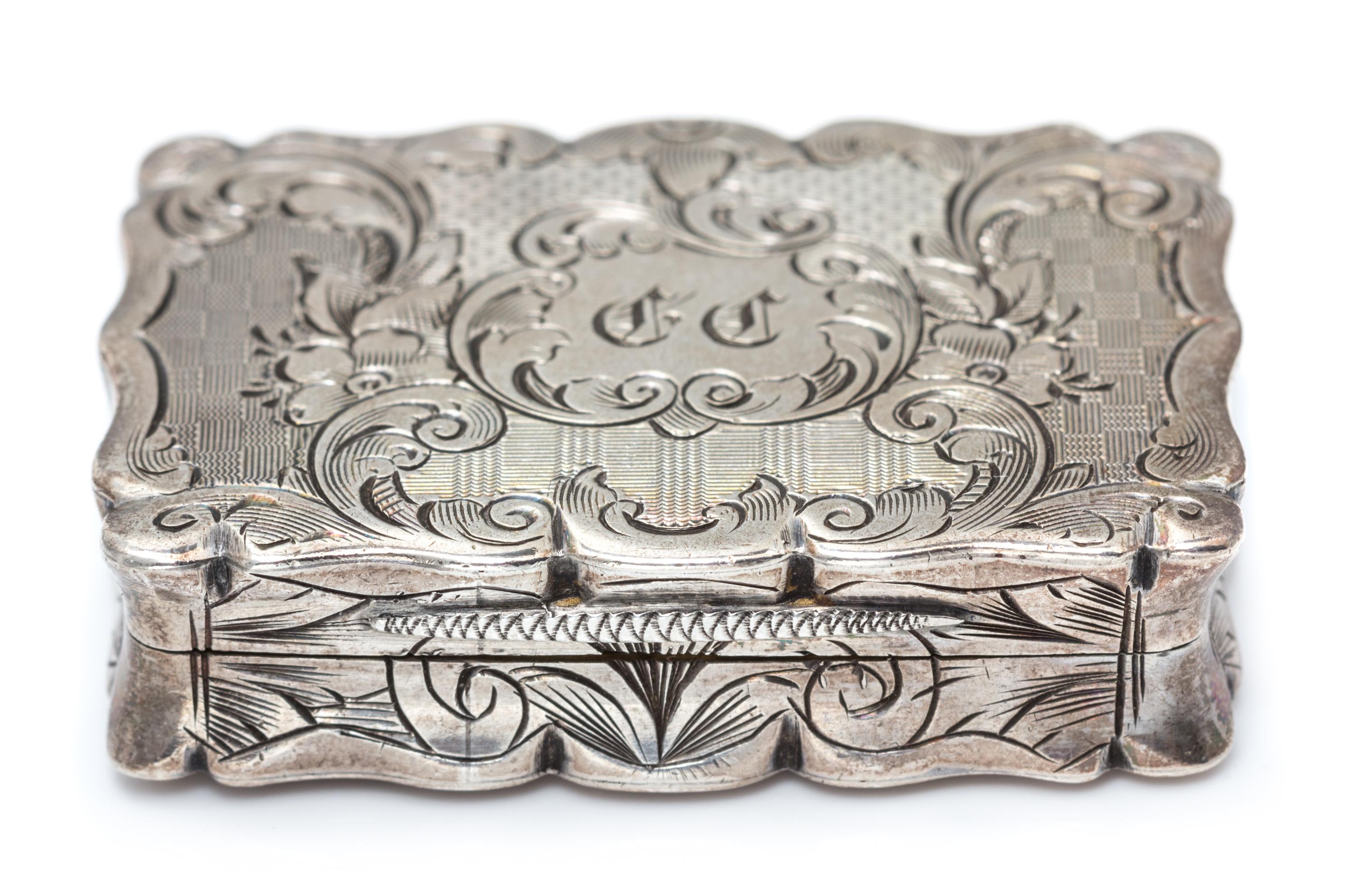 A Victorian Silver Vinaigrette, Frederick Marson, Birmingham, 1859, the case with floral, foliate, C-scroll and geometric decoration, t