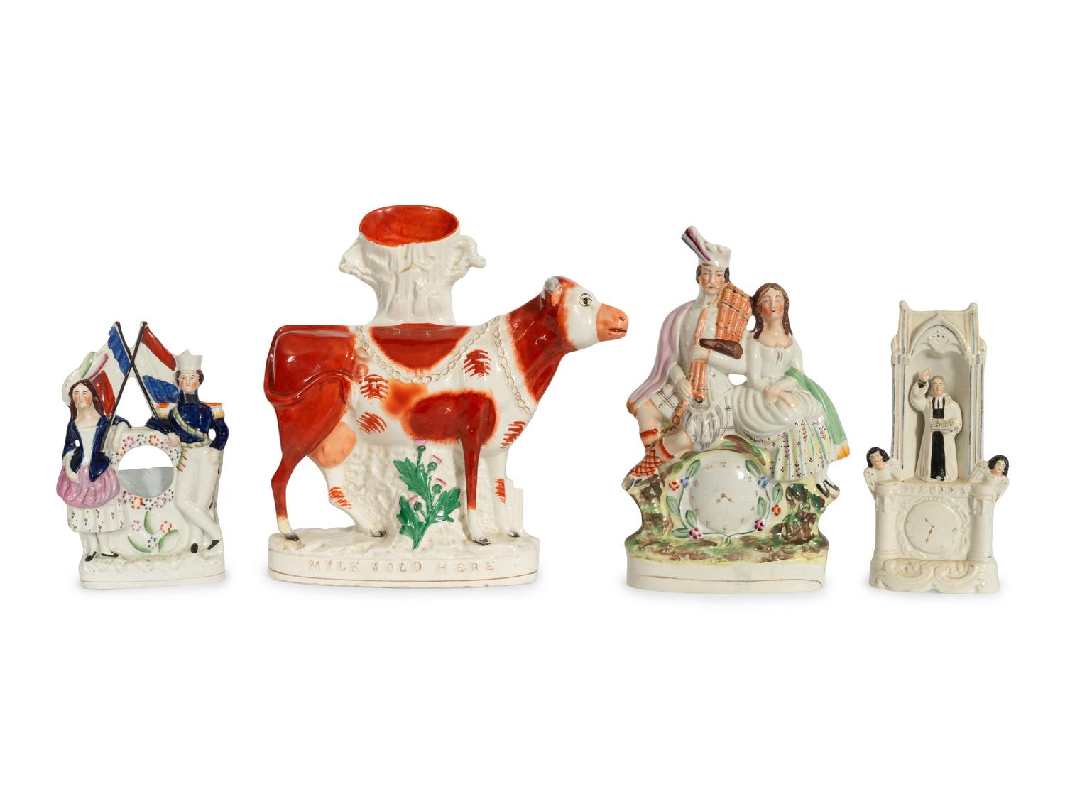 A Collection of Twelve Staffordshire Pottery Figures and Figural Wares