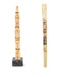 A Pair of Northwest Coast Carved Walrus Tusk Articles Height of taller 12 inches. — LATE 19TH/EARLY 20TH CENTURY