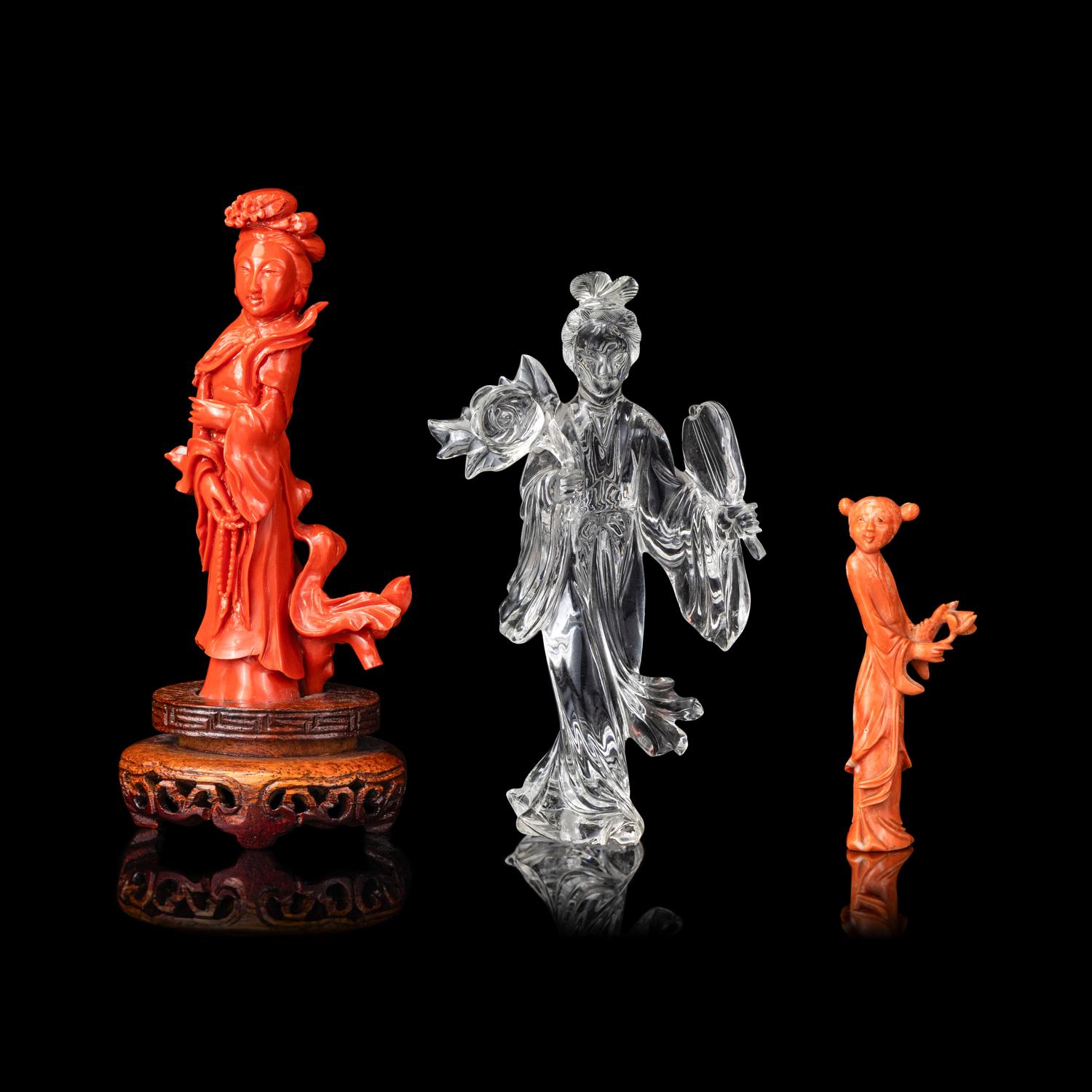 Two Chinese Red Coral Figures and a Rock Crystal Figure 珊瑚及水晶雕人物像三件