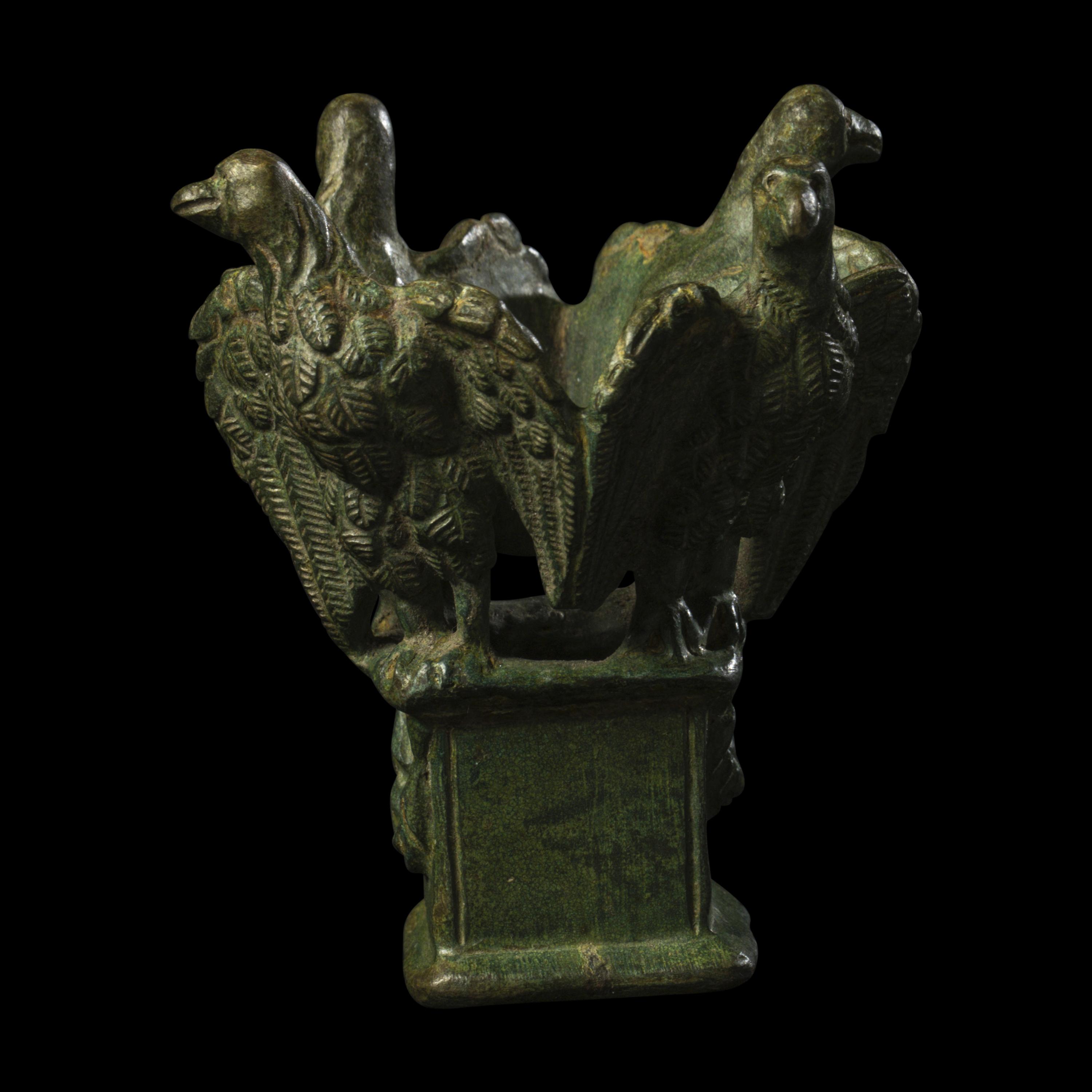 A Roman Bronze Lamp Stand with Four Eagles