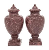 A Pair of Neoclassical Style Carved Porphyry Covered Urns