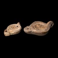 Two Roman Terracotta Lamps with Erotic Scenes