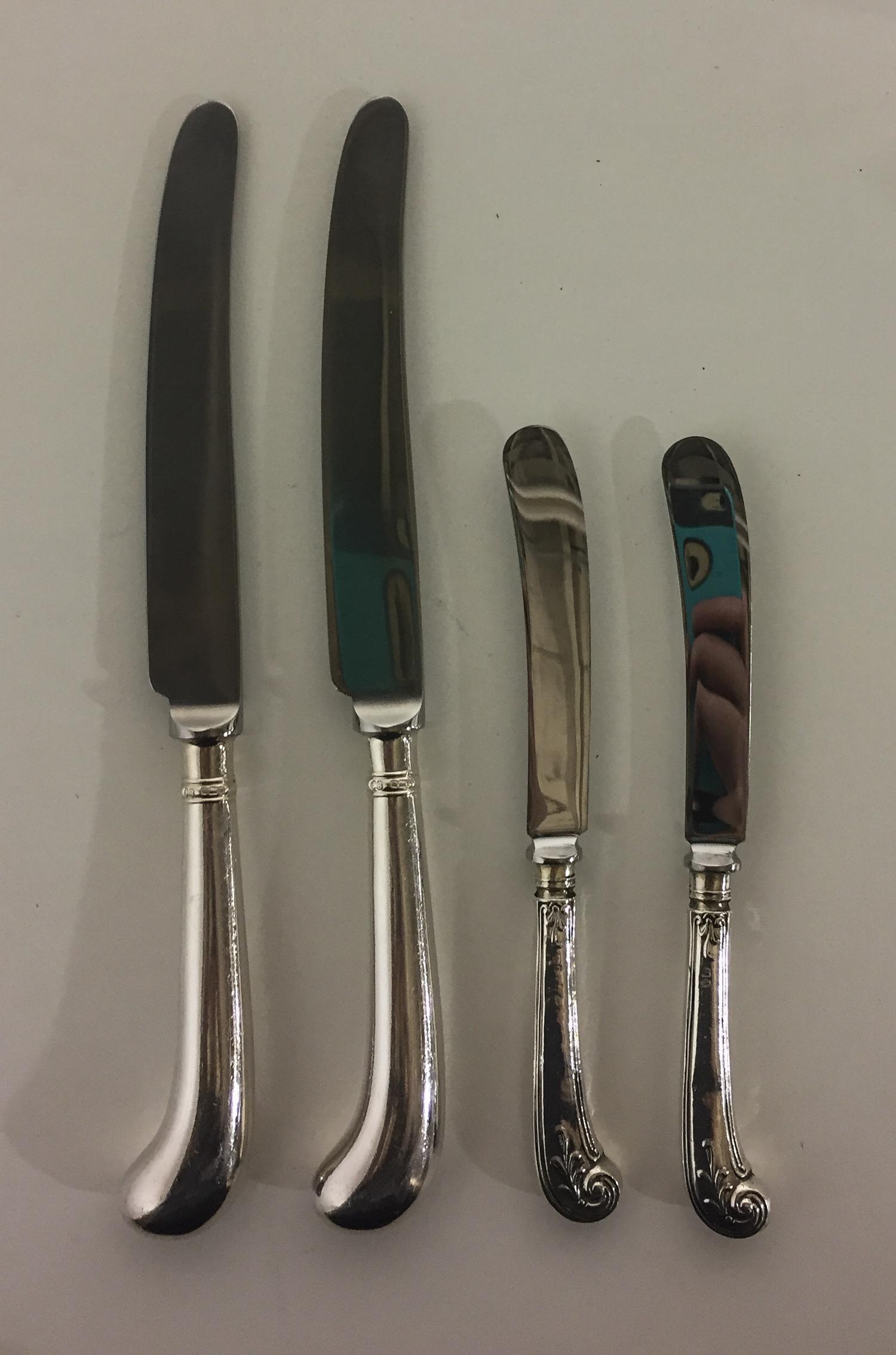 A Group of George V and Elizabeth II Silver Flatware, John Biggin, Sheffield, pistol-handled, comprising: 6 dinner knives, 1992 5 butte