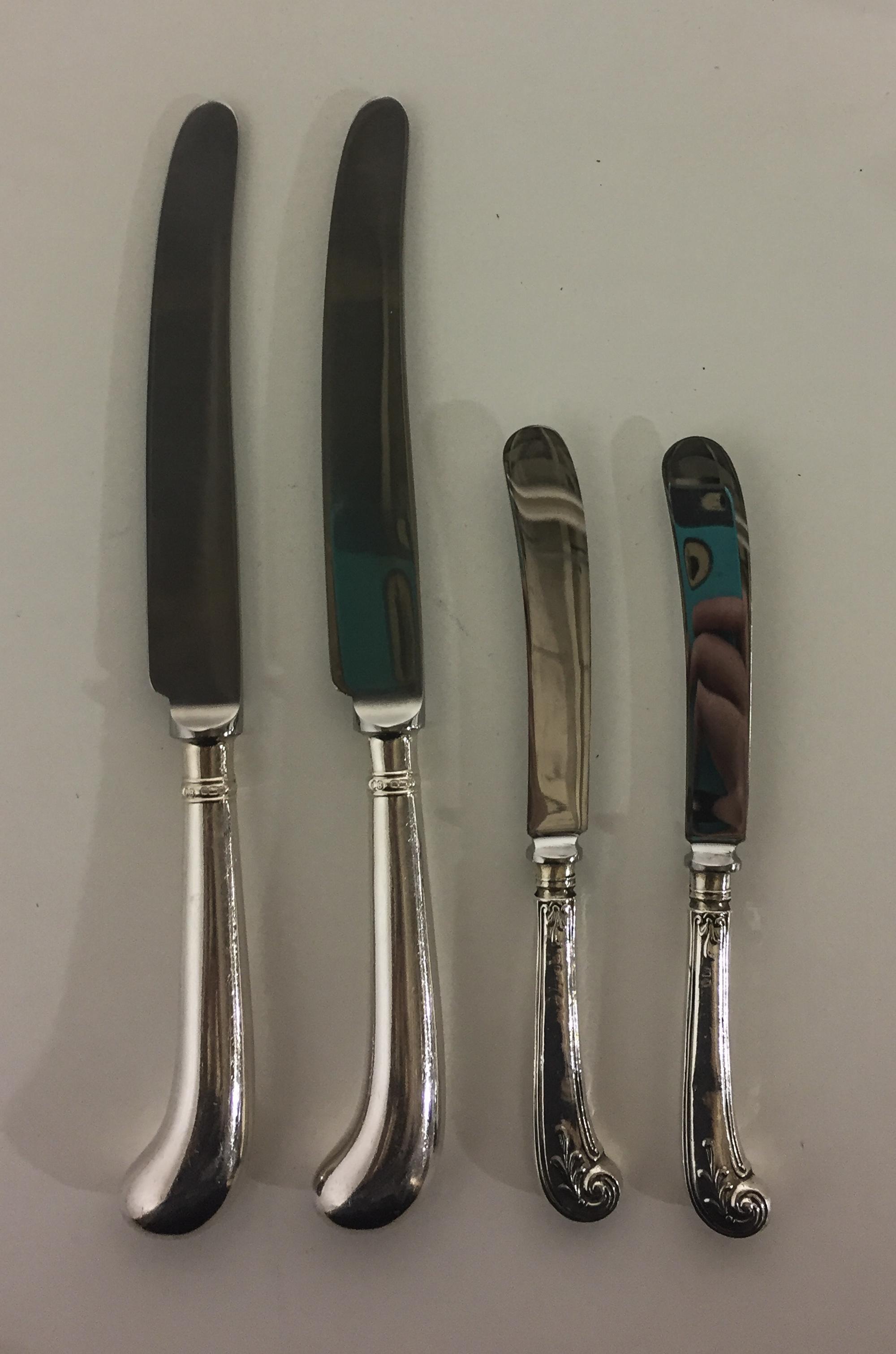 A Group of George V and Elizabeth II Silver Flatware, John Biggin, Sheffield, pistol-handled, comprising: 6 dinner knives, 1992 5 butte