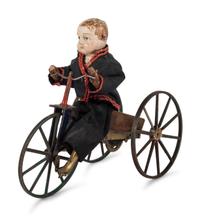 A Stevens & Brown Boy on Velocipede Automaton Toy