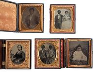 [EARLY PHOTOGRAPHY]. A group of 5 ambrotype and tintype portraits of African American subjects, including: