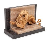 A Gilt Bronze and Limestone Lion Bookend