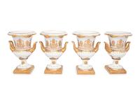 A Set of Four Gilt-Decorated Porcelain Urns