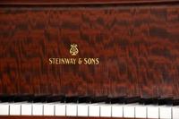 A Steinway and Sons Mahogany Baby Grand Piano