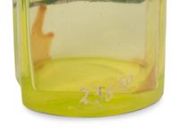 A Group of Green Glass Apothecary Bottles