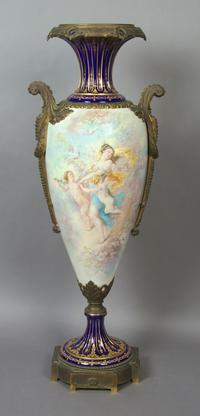 A Sevres Style Porcelain and Bronze Mounted Urn, Height 35 3/4 inches.