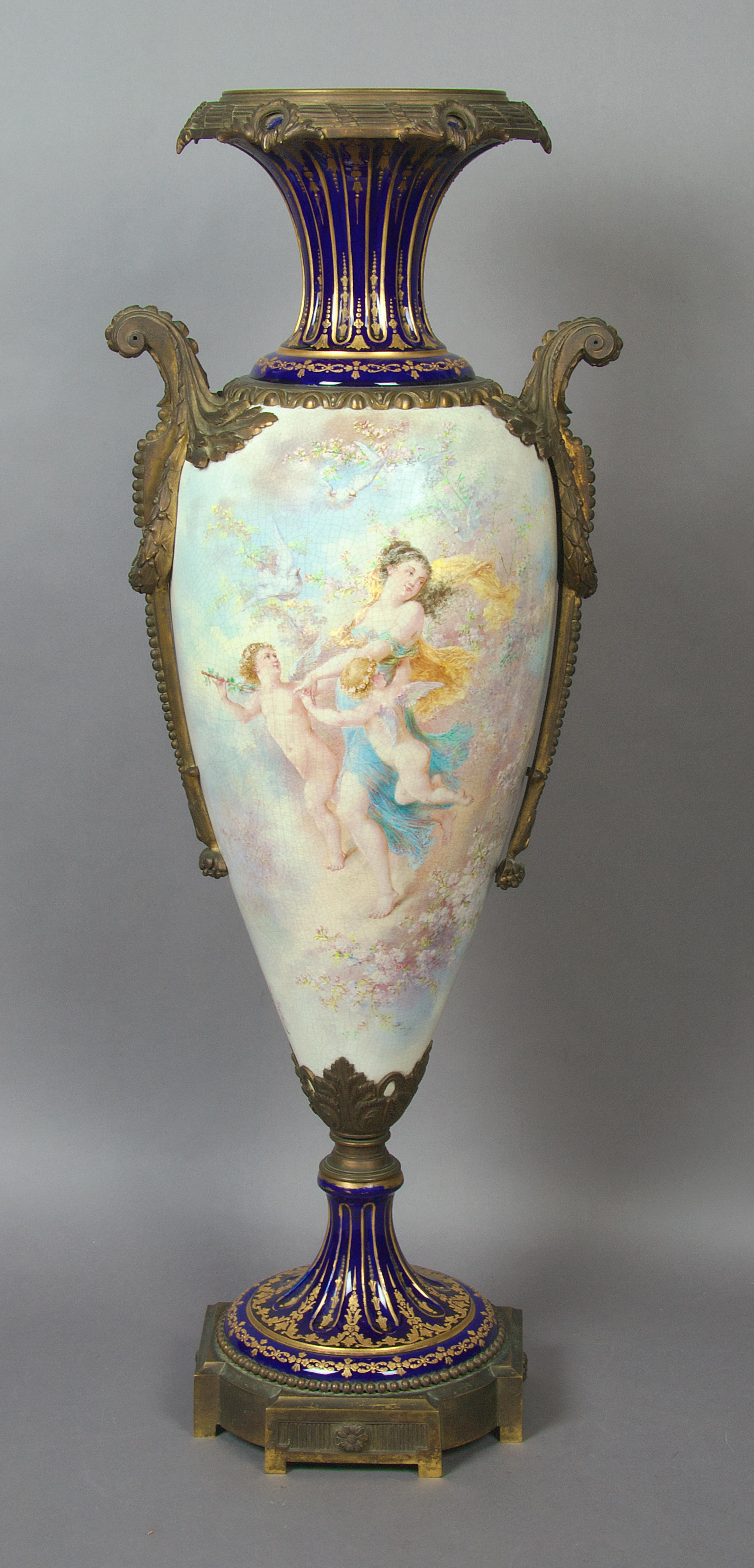 A Sevres Style Porcelain and Bronze Mounted Urn, Height 35 3/4 inches.